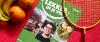 magazine, mandarijnen en een tennisracket liggen op tafel